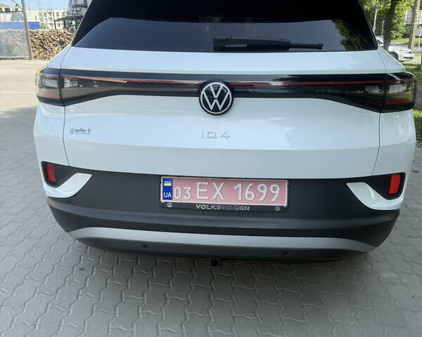 Белый Фольксваген ID.4, объемом двигателя 0 л и пробегом 55 тыс. км за 24300 $, фото 1 на Automoto.ua