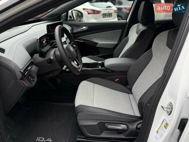 Белый Фольксваген ID.4, объемом двигателя 0 л и пробегом 8 тыс. км за 25900 $, фото 38 на Automoto.ua