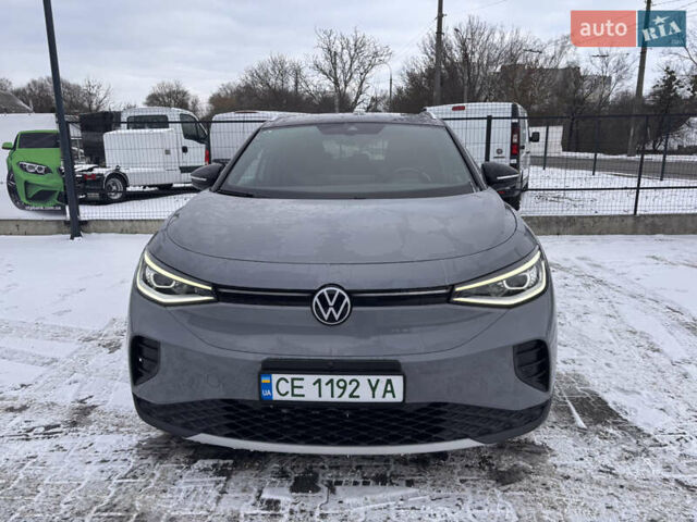 Серый Фольксваген ID.4, объемом двигателя 0 л и пробегом 33 тыс. км за 22800 $, фото 1 на Automoto.ua