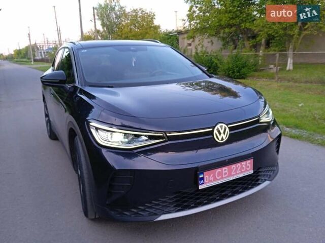 Синий Фольксваген ID.4, объемом двигателя 0 л и пробегом 29 тыс. км за 27300 $, фото 1 на Automoto.ua