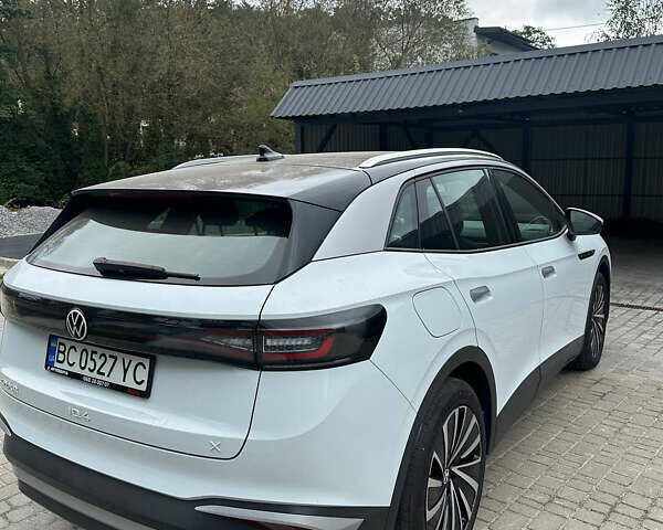 Белый Фольксваген ID.4 X, объемом двигателя 0 л и пробегом 26 тыс. км за 22900 $, фото 1 на Automoto.ua