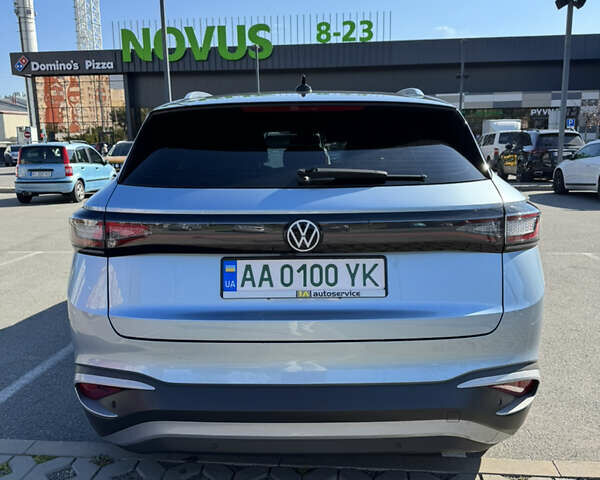 Синий Фольксваген ID.4 X, объемом двигателя 0 л и пробегом 54 тыс. км за 24500 $, фото 3 на Automoto.ua