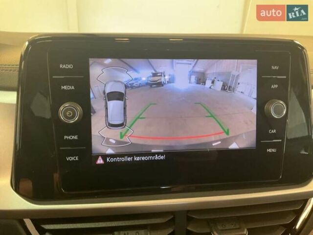 Серый Фольксваген Ти-Рок, объемом двигателя 2 л и пробегом 170 тыс. км за 21999 $, фото 10 на Automoto.ua