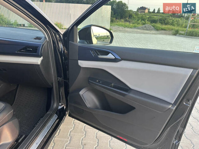 Черный Фольксваген Таос, объемом двигателя 1.5 л и пробегом 77 тыс. км за 18800 $, фото 65 на Automoto.ua