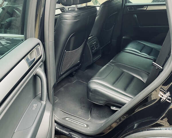 Черный Фольксваген Touareg R, объемом двигателя 3 л и пробегом 205 тыс. км за 26500 $, фото 16 на Automoto.ua