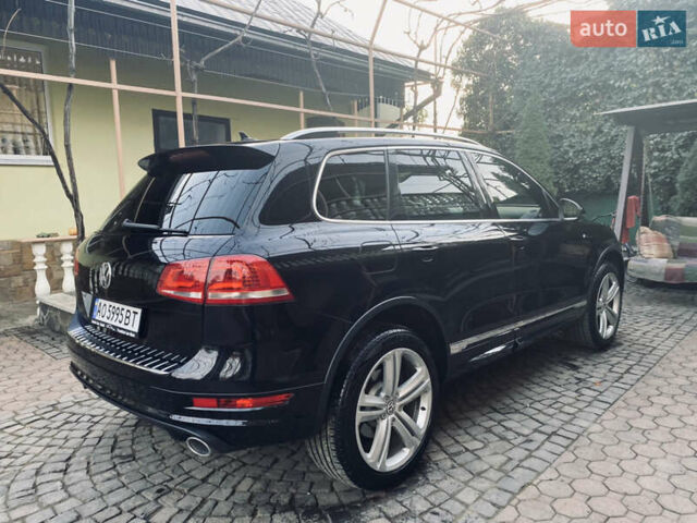Черный Фольксваген Touareg R, объемом двигателя 3 л и пробегом 205 тыс. км за 26500 $, фото 4 на Automoto.ua