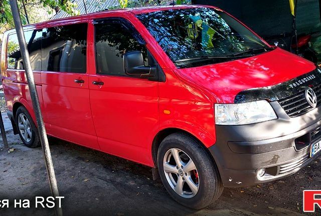 Красный Фольксваген Transporter, объемом двигателя 2.5 л и пробегом 285 тыс. км за 9000 $, фото 1 на Automoto.ua