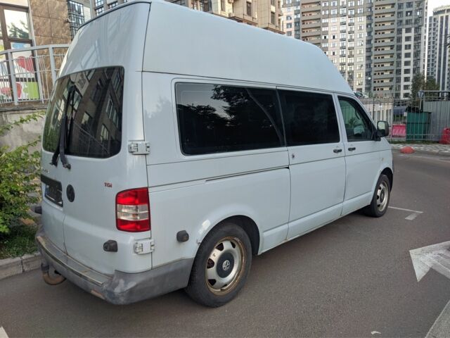 Серый Фольксваген Transporter, объемом двигателя 2.5 л и пробегом 382 тыс. км за 8500 $, фото 2 на Automoto.ua