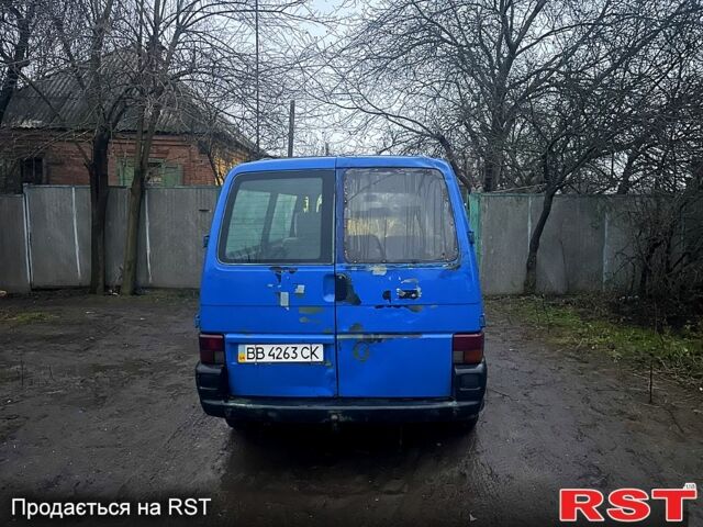 Синий Фольксваген Transporter, объемом двигателя 2.5 л и пробегом 200 тыс. км за 3800 $, фото 2 на Automoto.ua