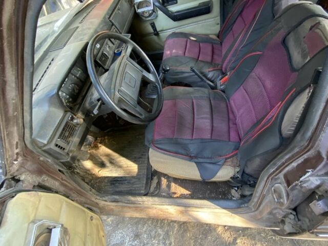 Коричневый Вольво 244, объемом двигателя 2 л и пробегом 219 тыс. км за 480 $, фото 4 на Automoto.ua