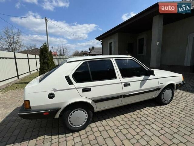 Белый Вольво 340, объемом двигателя 1.6 л и пробегом 231 тыс. км за 2300 $, фото 1 на Automoto.ua