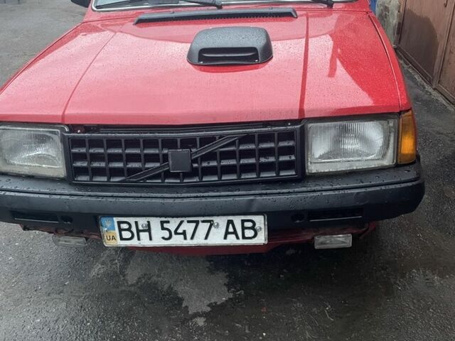 Красный Вольво 340, объемом двигателя 2 л и пробегом 100 тыс. км за 40813 $, фото 1 на Automoto.ua
