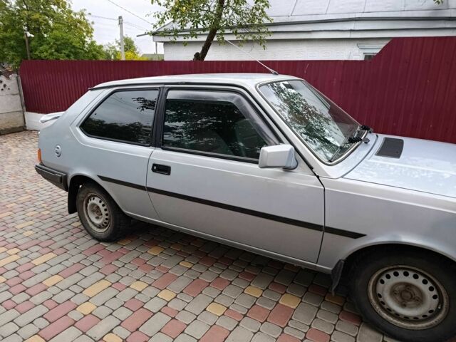 Серый Вольво 340, объемом двигателя 2 л и пробегом 240 тыс. км за 1000 $, фото 5 на Automoto.ua