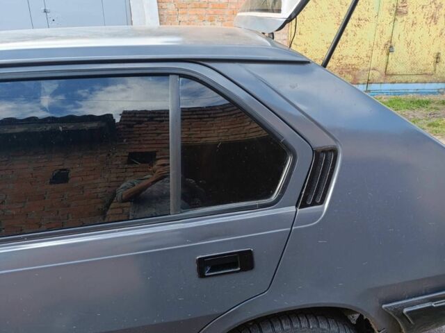 Серый Вольво 340, объемом двигателя 0 л и пробегом 230 тыс. км за 724 $, фото 1 на Automoto.ua