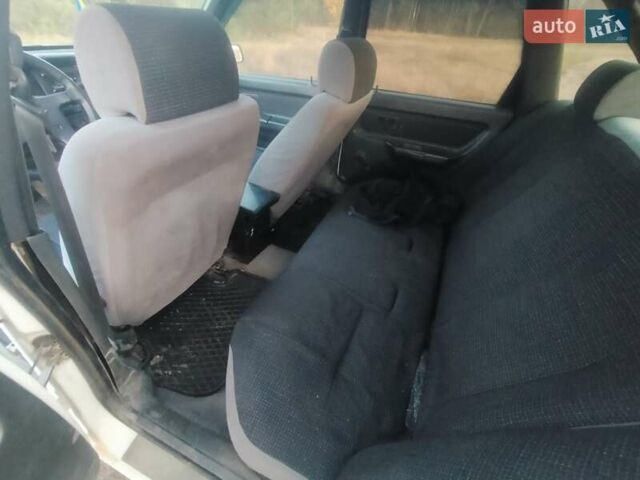 Белый Вольво 440, объемом двигателя 1.8 л и пробегом 272 тыс. км за 800 $, фото 1 на Automoto.ua