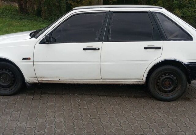 Білий Вольво 440, об'ємом двигуна 1.8 л та пробігом 275 тис. км за 650 $, фото 2 на Automoto.ua
