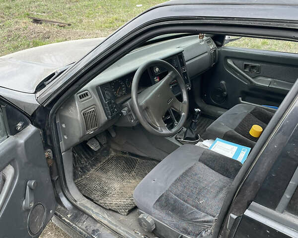 Черный Вольво 440, объемом двигателя 1.7 л и пробегом 236 тыс. км за 750 $, фото 11 на Automoto.ua