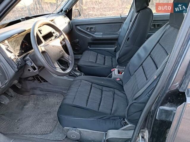 Чорний Вольво 440, об'ємом двигуна 1.7 л та пробігом 100 тис. км за 1999 $, фото 6 на Automoto.ua