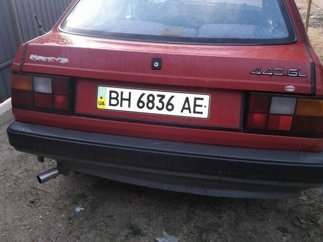 Красный Вольво 440, объемом двигателя 1.7 л и пробегом 250 тыс. км за 600 $, фото 1 на Automoto.ua