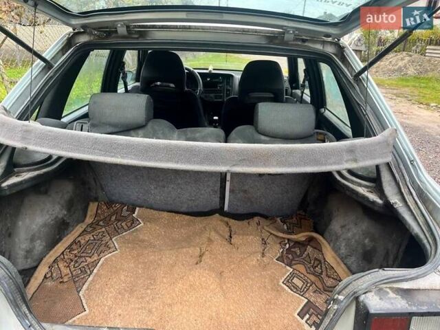 Серый Вольво 440, объемом двигателя 2 л и пробегом 290 тыс. км за 820 $, фото 4 на Automoto.ua