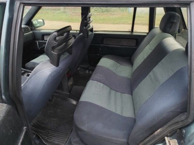 Зеленый Вольво 740, объемом двигателя 2.3 л и пробегом 318 тыс. км за 1200 $, фото 7 на Automoto.ua