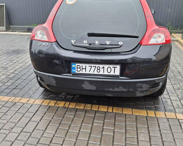 Черный Вольво Ц30, объемом двигателя 1.6 л и пробегом 286 тыс. км за 5200 $, фото 7 на Automoto.ua