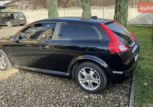 Черный Вольво Ц30, объемом двигателя 1.56 л и пробегом 455 тыс. км за 6500 $, фото 6 на Automoto.ua