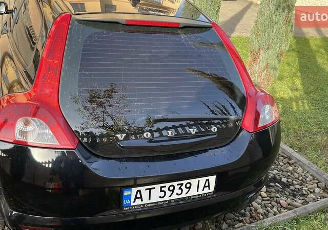 Черный Вольво Ц30, объемом двигателя 1.56 л и пробегом 455 тыс. км за 6500 $, фото 4 на Automoto.ua