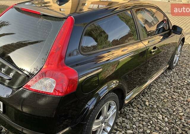 Черный Вольво Ц30, объемом двигателя 1.56 л и пробегом 455 тыс. км за 6500 $, фото 5 на Automoto.ua