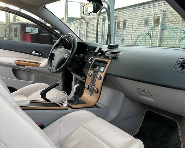 Черный Вольво Ц30, объемом двигателя 1.6 л и пробегом 258 тыс. км за 6500 $, фото 12 на Automoto.ua