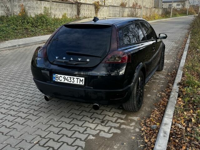Черный Вольво Ц30, объемом двигателя 1.6 л и пробегом 348 тыс. км за 5600 $, фото 1 на Automoto.ua