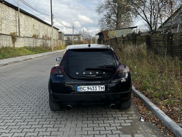 Черный Вольво Ц30, объемом двигателя 1.6 л и пробегом 348 тыс. км за 5600 $, фото 2 на Automoto.ua
