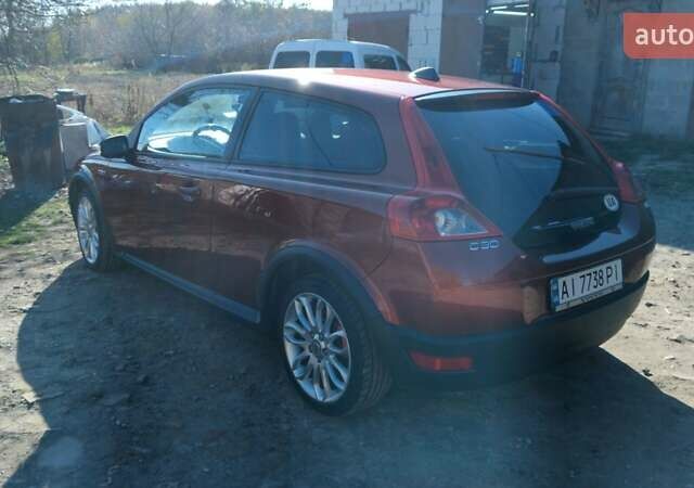 Коричневый Вольво Ц30, объемом двигателя 1.6 л и пробегом 250 тыс. км за 6200 $, фото 20 на Automoto.ua