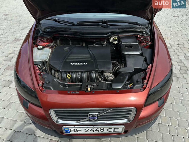Красный Вольво Ц30, объемом двигателя 1.8 л и пробегом 190 тыс. км за 5300 $, фото 14 на Automoto.ua