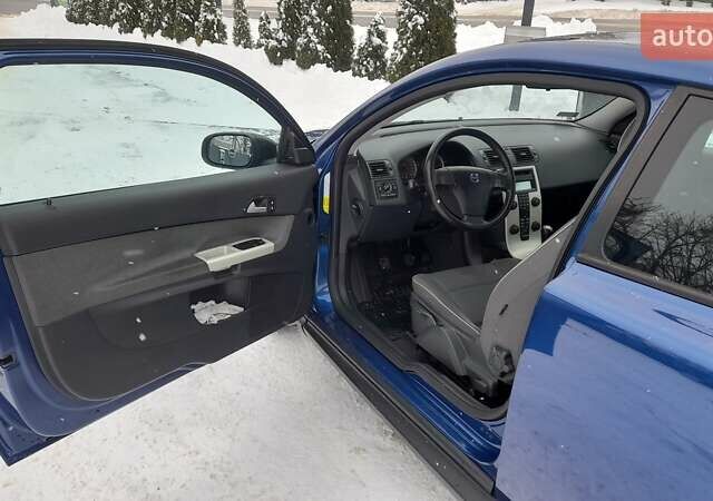 Синий Вольво Ц30, объемом двигателя 1.56 л и пробегом 172 тыс. км за 6200 $, фото 25 на Automoto.ua