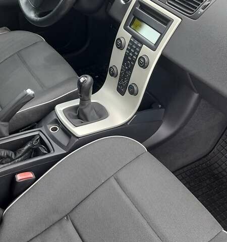 Синий Вольво Ц30, объемом двигателя 1.56 л и пробегом 172 тыс. км за 6200 $, фото 22 на Automoto.ua