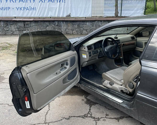 Сірий Вольво C70, об'ємом двигуна 2.44 л та пробігом 270 тис. км за 3600 $, фото 5 на Automoto.ua