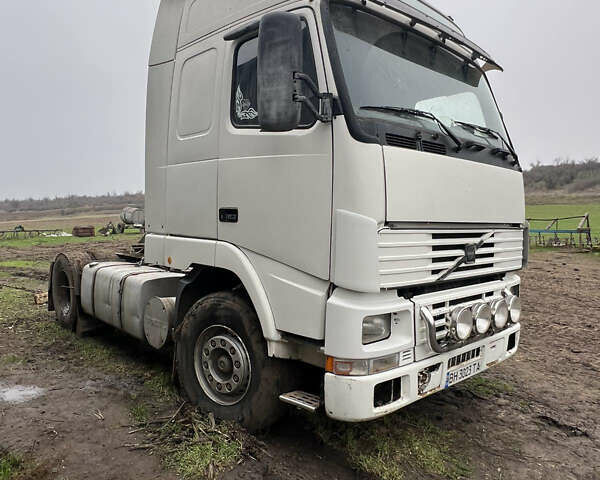 Белый Вольво FH 12, объемом двигателя 12.13 л и пробегом 600 тыс. км за 3600 $, фото 1 на Automoto.ua