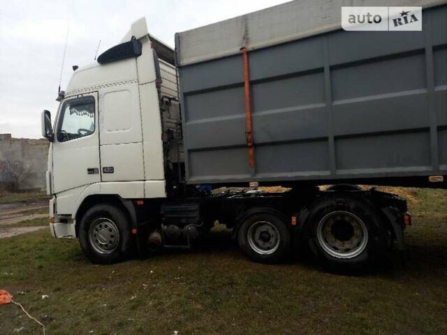 Белый Вольво FH 12, объемом двигателя 12.1 л и пробегом 629 тыс. км за 17000 $, фото 1 на Automoto.ua