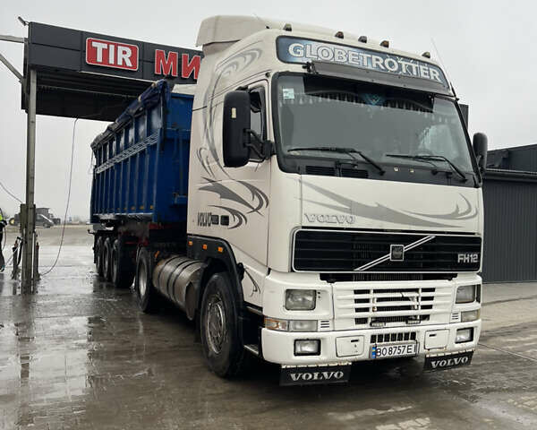 Белый Вольво FH 12, объемом двигателя 12 л и пробегом 570 тыс. км за 12000 $, фото 1 на Automoto.ua
