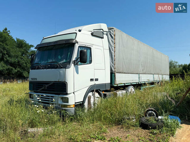 Белый Вольво FH 12, объемом двигателя 12.1 л и пробегом 993 тыс. км за 10500 $, фото 2 на Automoto.ua