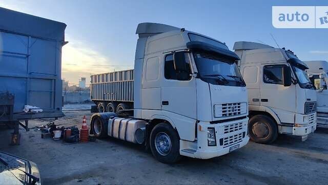 Белый Вольво FH 12, объемом двигателя 12.1 л и пробегом 768 тыс. км за 8000 $, фото 1 на Automoto.ua