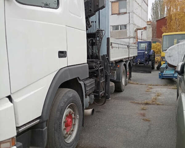 Білий Вольво FH 12, об'ємом двигуна 12.1 л та пробігом 100 тис. км за 34500 $, фото 1 на Automoto.ua