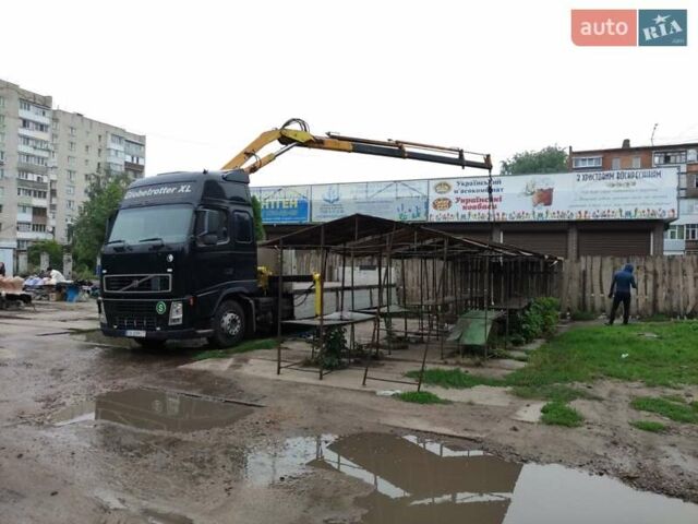 Черный Вольво FH 12, объемом двигателя 12.1 л и пробегом 258 тыс. км за 28000 $, фото 9 на Automoto.ua