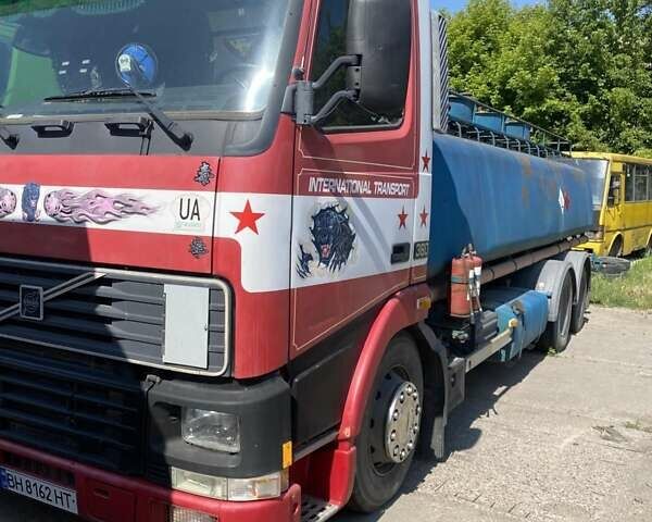 Красный Вольво FH 12, объемом двигателя 12.5 л и пробегом 100 тыс. км за 28500 $, фото 4 на Automoto.ua