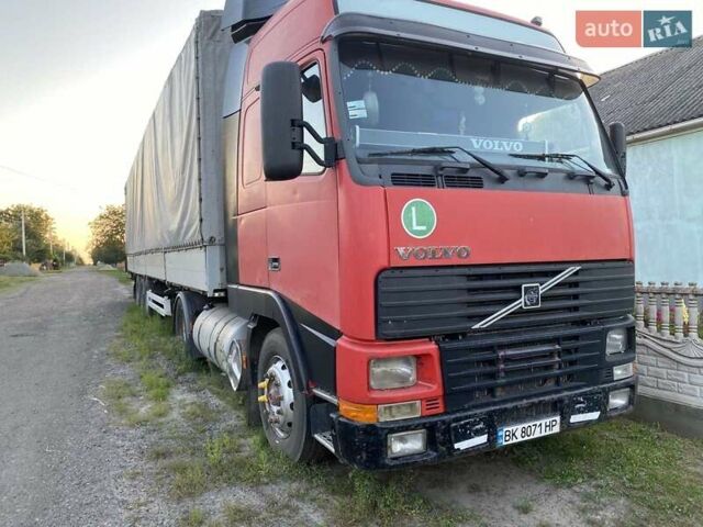 Червоний Вольво FH 12, об'ємом двигуна 12.13 л та пробігом 780 тис. км за 8500 $, фото 1 на Automoto.ua