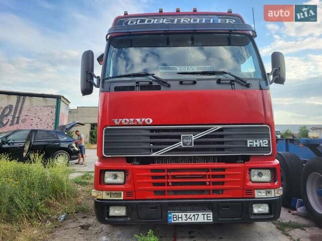 Красный Вольво FH 12, объемом двигателя 12.1 л и пробегом 700 тыс. км за 10500 $, фото 1 на Automoto.ua