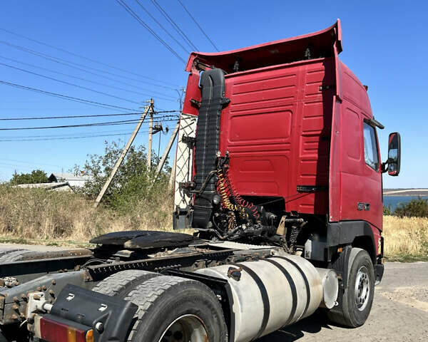 Красный Вольво FH 12, объемом двигателя 12.11 л и пробегом 1000 тыс. км за 6600 $, фото 1 на Automoto.ua