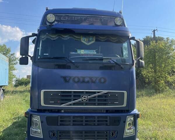 Синий Вольво FH 12, объемом двигателя 12.13 л и пробегом 1 тыс. км за 8000 $, фото 4 на Automoto.ua