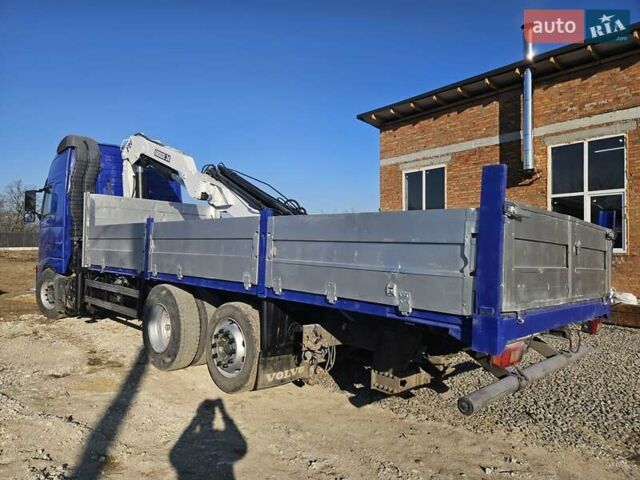 Синий Вольво FH 12, объемом двигателя 12 л и пробегом 140 тыс. км за 32500 $, фото 19 на Automoto.ua